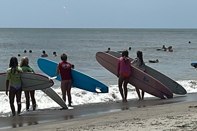 Surf lesson with KTO Yoga Surf - Weather, fitness, and group size: set yourself up for a smooth lesson